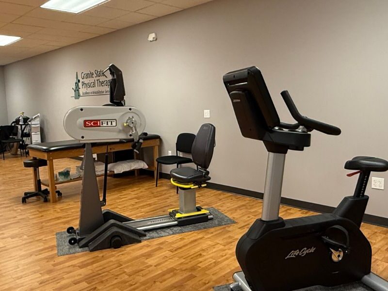 Clinic treatment room with physical therapy equipment